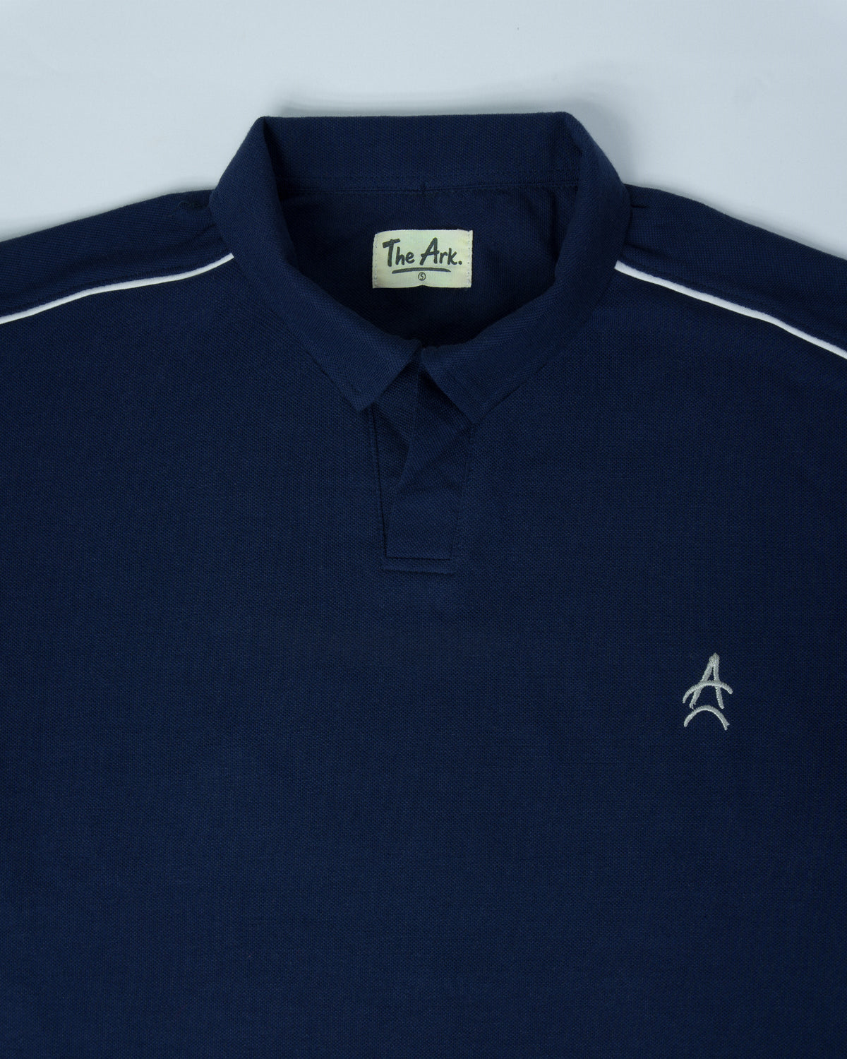The Ark Piped Polo — Oxford Blue