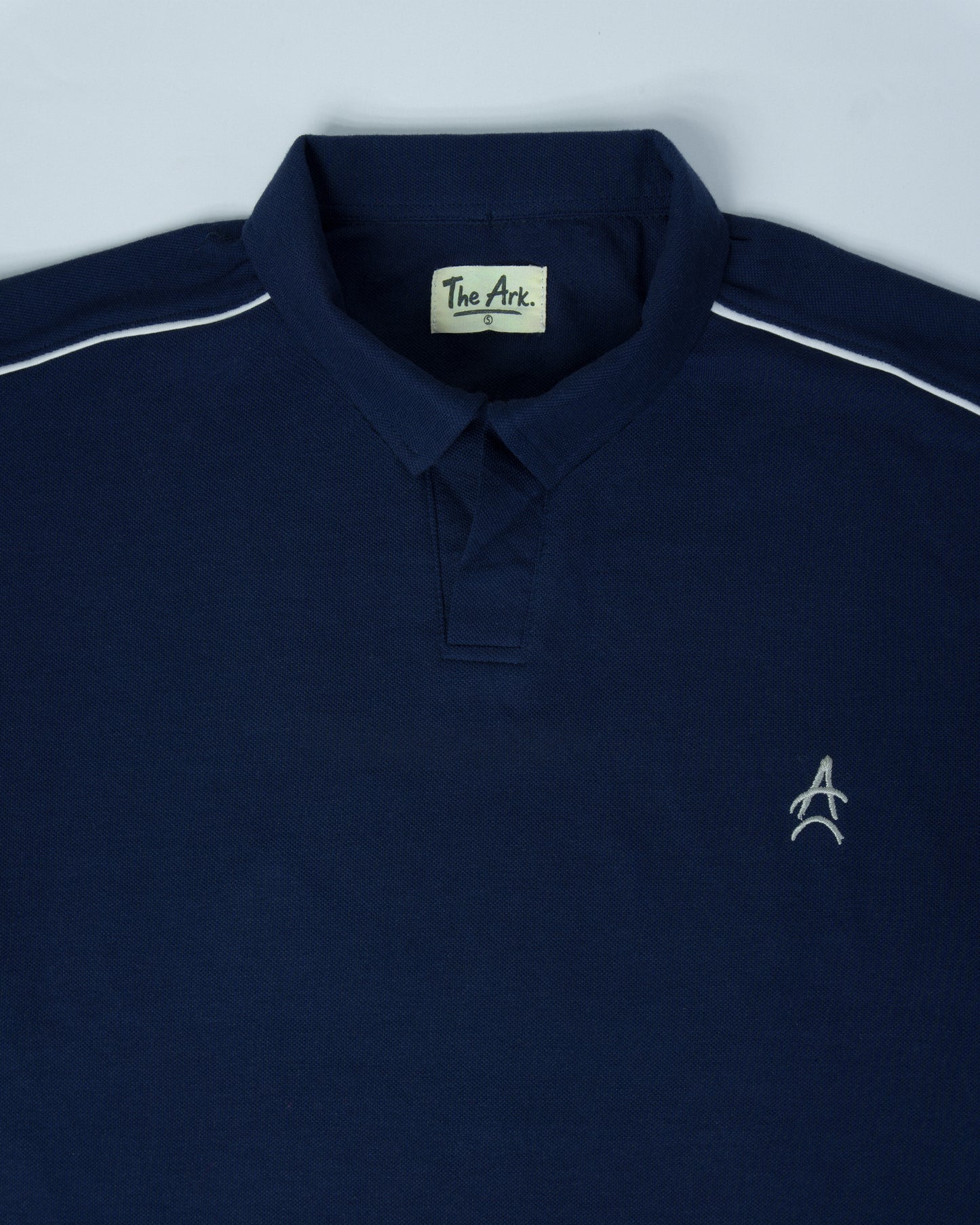 The Ark Piped Polo — Oxford Blue