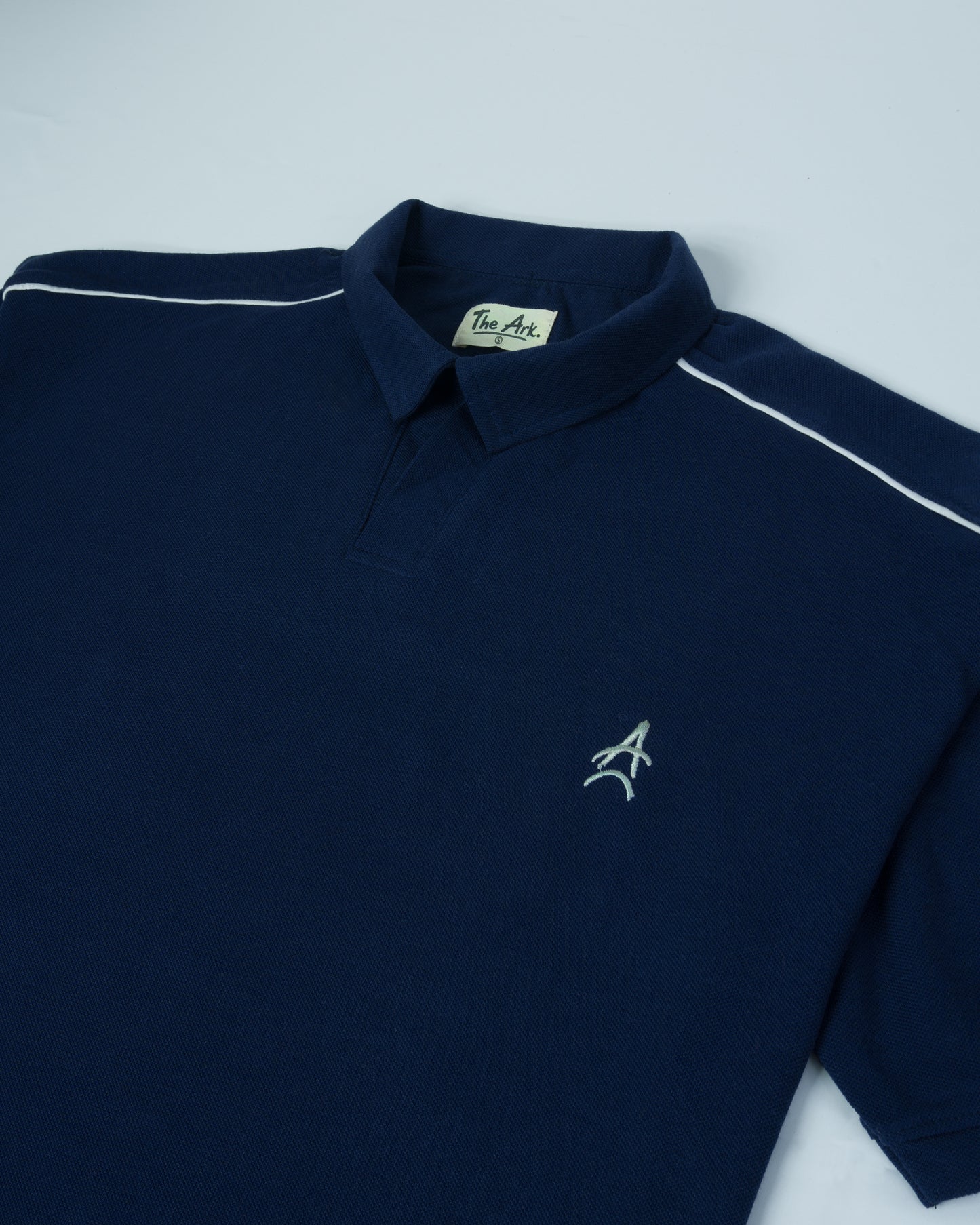 The Ark Piped Polo — Oxford Blue